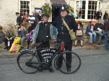 Chimney sweep with village policeman and bike at the Pickering 1940s weekend