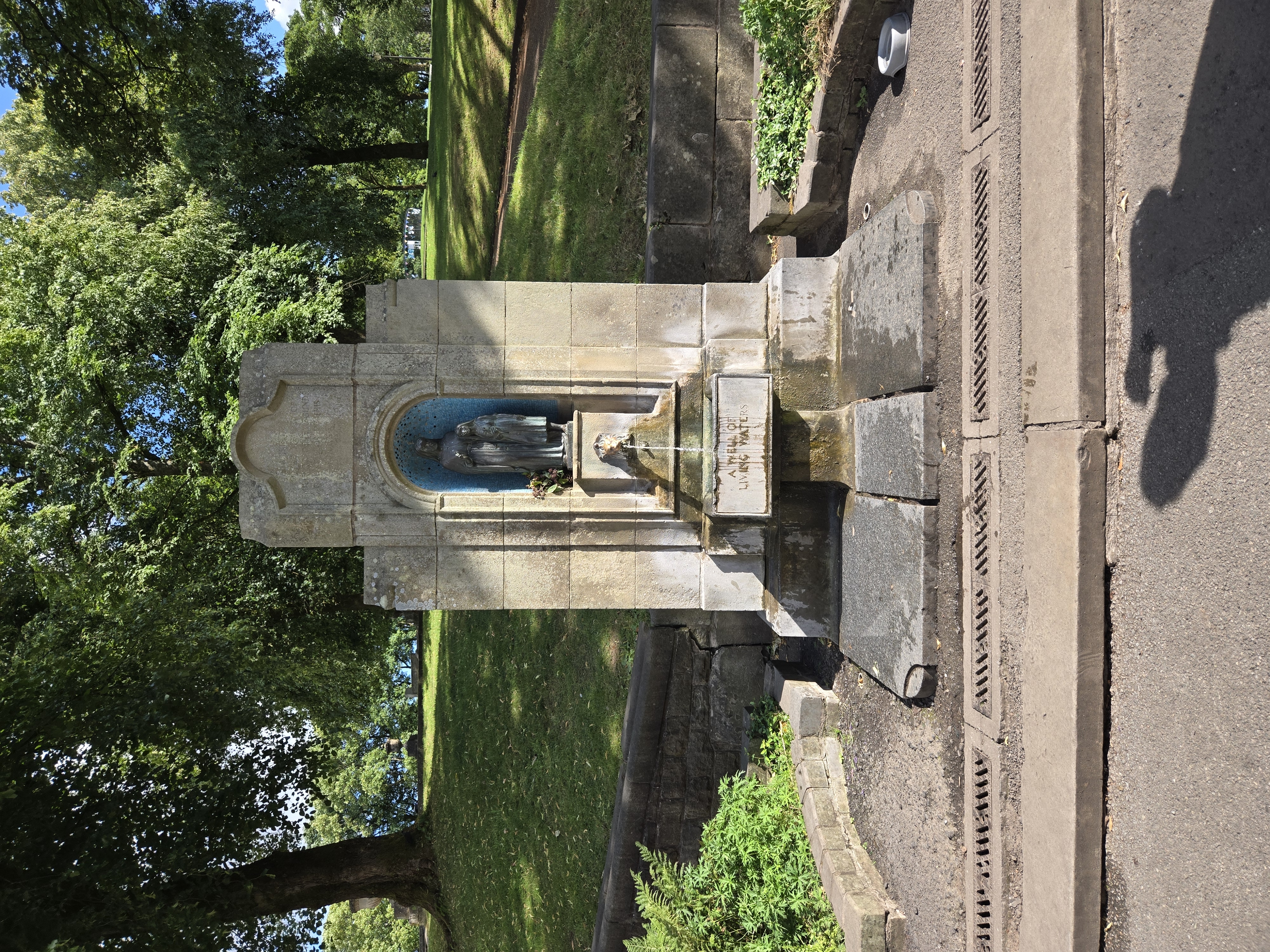 Spring well in park with imagery of St Ann