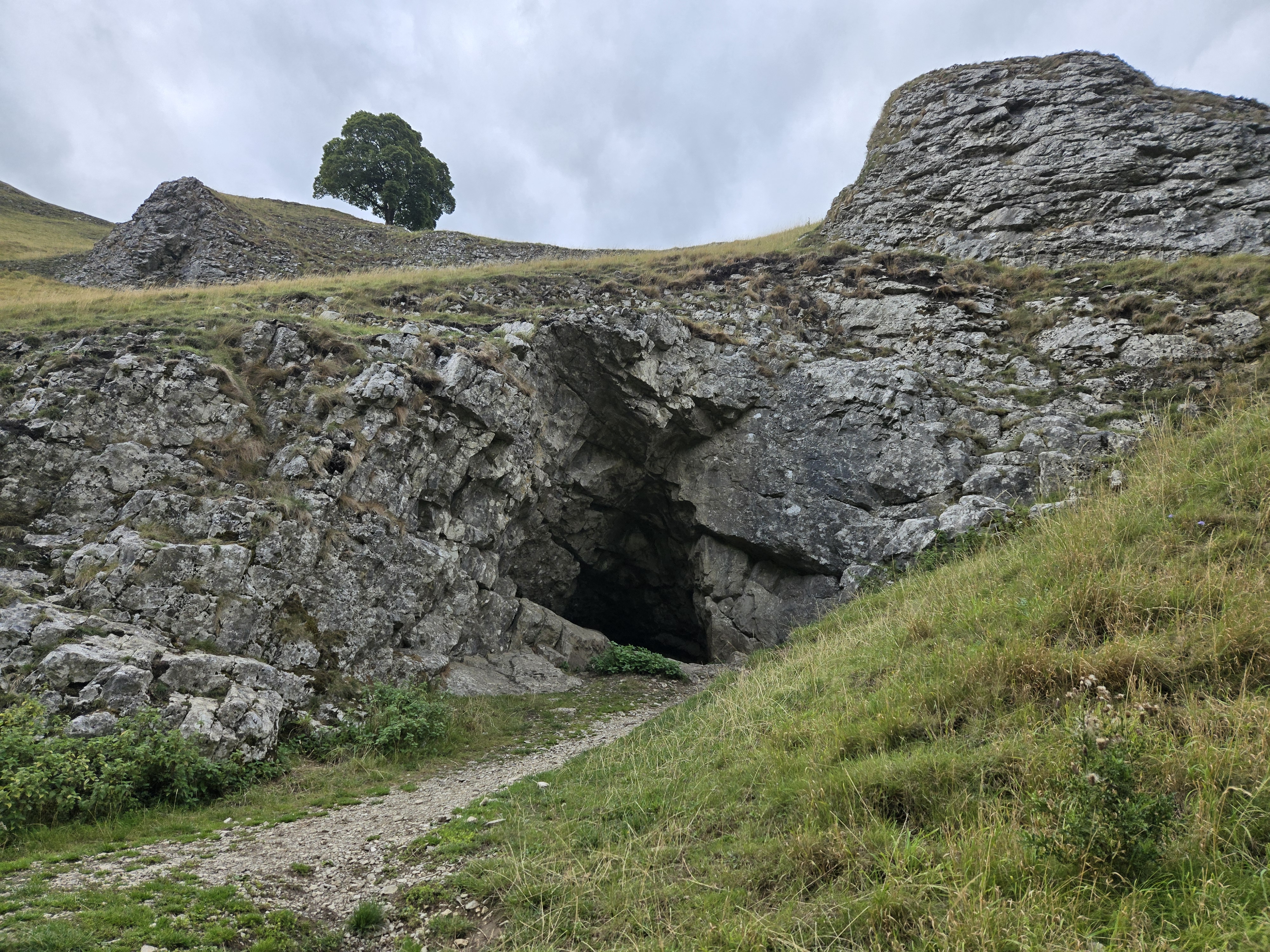Cave in limestone cliff