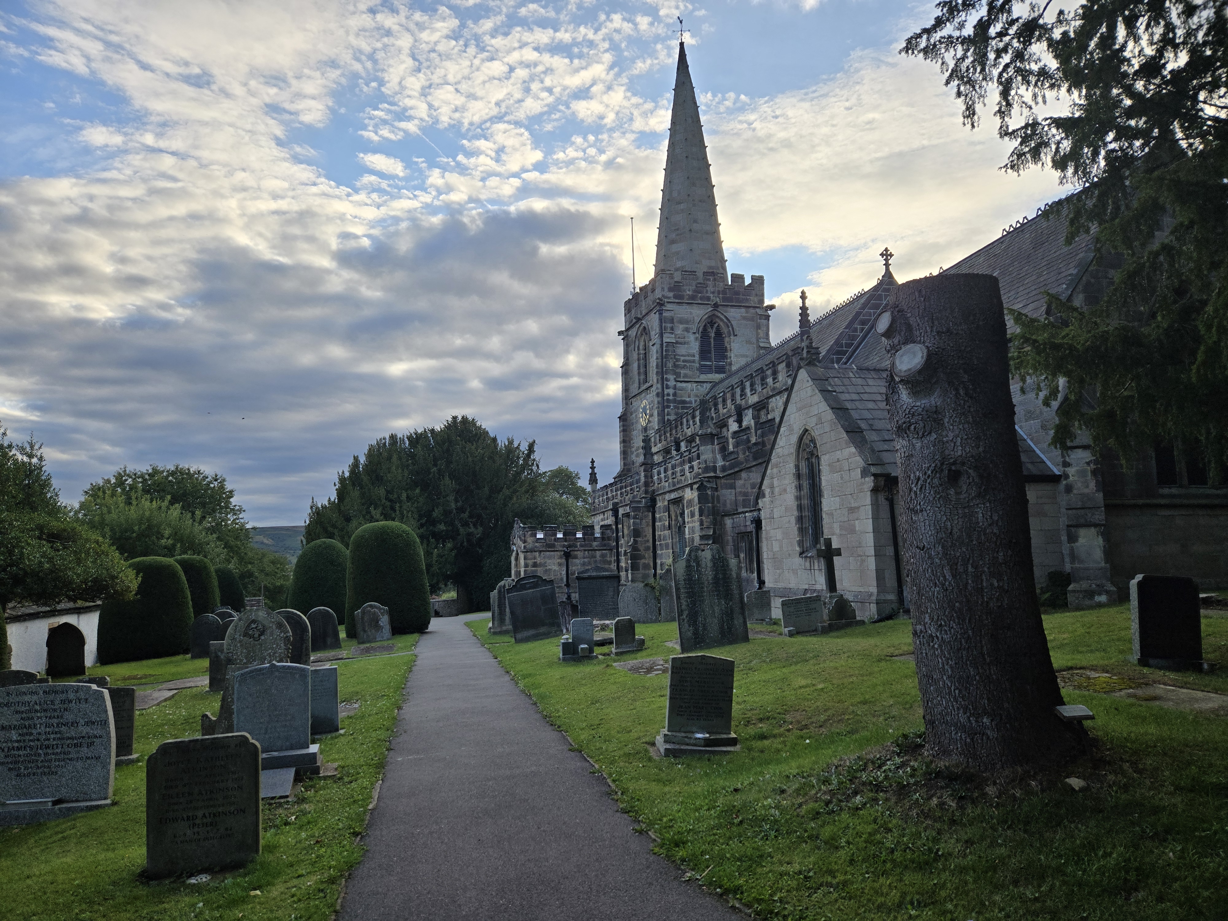 Church with spire and graveyard
